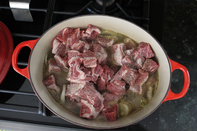 cooking braised carnitas